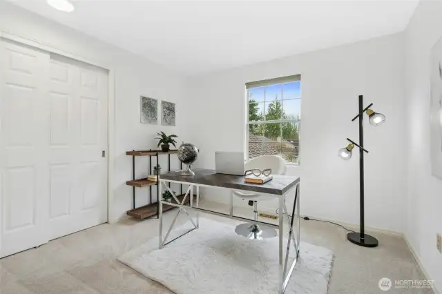 Another guest room staged as a home office.