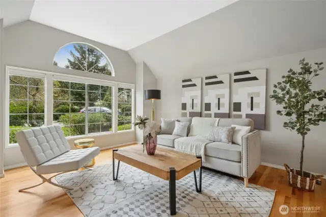 Formal living room with a vaulted ceiling.