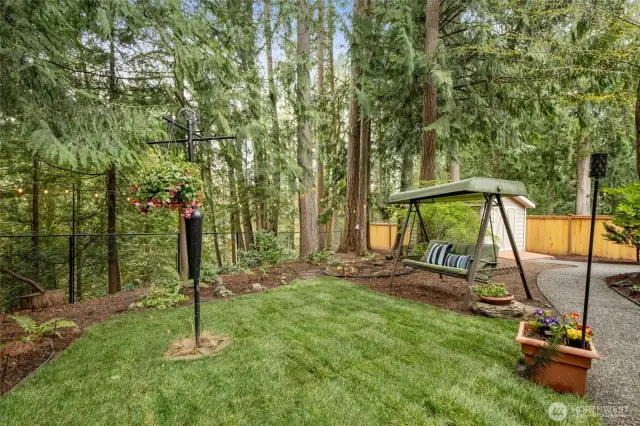 A stunning backyard with peaceful views and sounds.