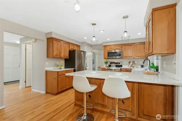 Counter top has a lip to accommodate bar stools and additional cabinetry underneath.