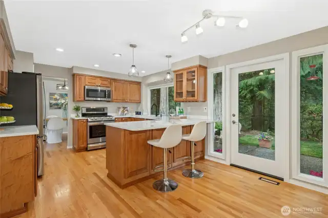 Informal breakfast nook eating area with a French door leading to the backyard area.