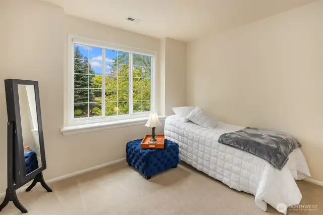 2nd upstairs bedroom suite with peaceful views.