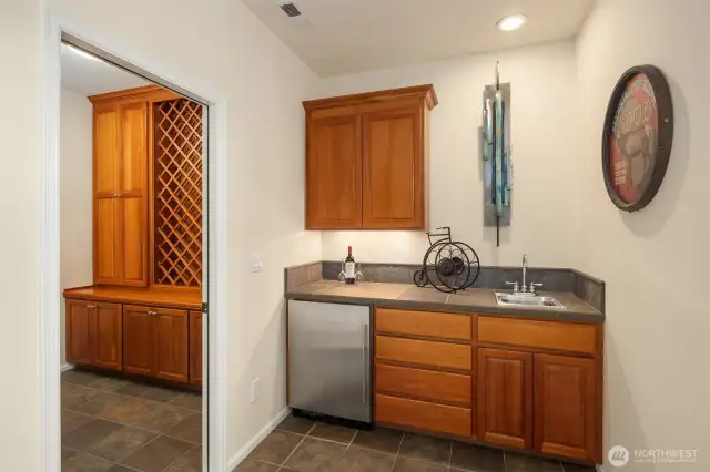 Don't miss the wet bar & temperature-controlled wine storage!