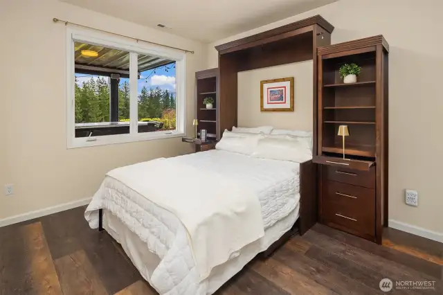 Lower-level guest suite with full bath.
