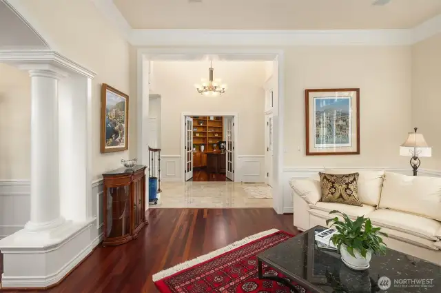 Beautiful crown molding, wainscoting & decorative columns lend a sense of elegance.