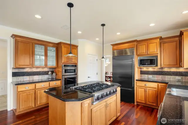 Cook with joy on top-tier built-in appliances, including a SubZero.