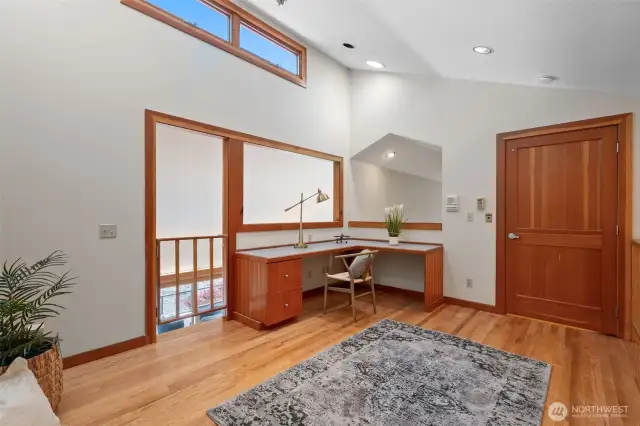 Upper level loft/office/library with elevator access.