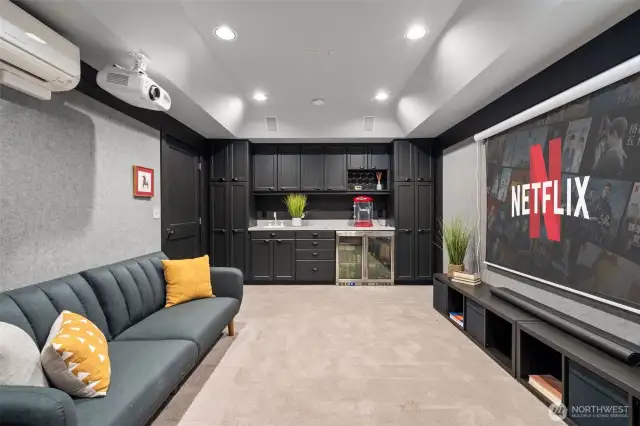 Awesome theater room with wet bar and mini-fridge!