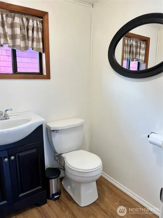 1/2 Bath off of the side entry/mudroom