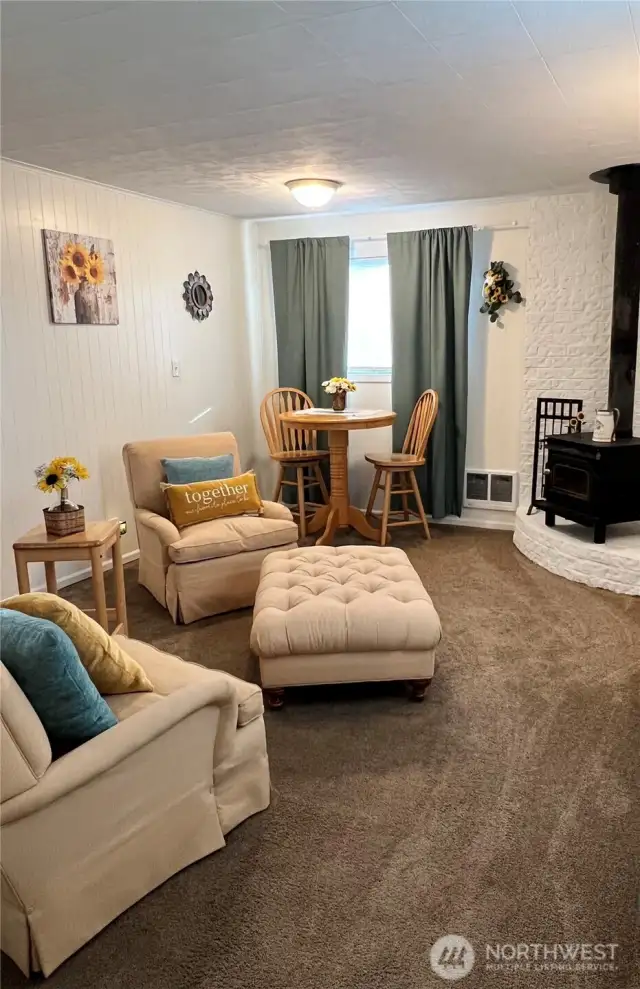 Den/Extra Living Room with Wood Fireplace and electric heat
