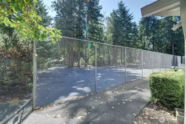 Sports court is close to community club house and swimming pool
