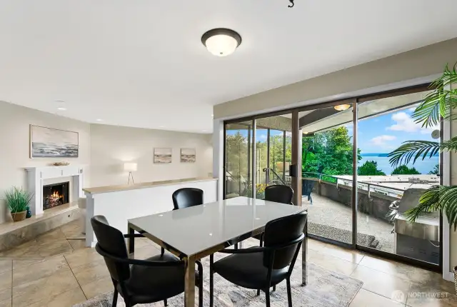 Looking back at the living are from the dining room. Marble tile flooring throughout the condo provides an elegant impression.