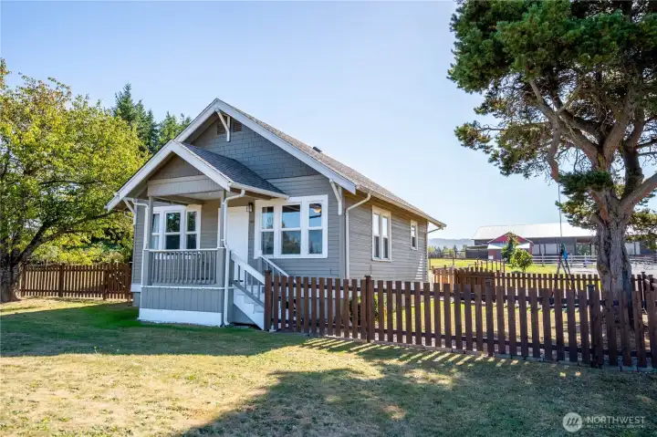 Attractively handsome, solid Craftsman style home in the fornt of the property.  A more sizeable home could be built in the upper acreage that would have a great view of Mt. Baker and this home could be an ADU.