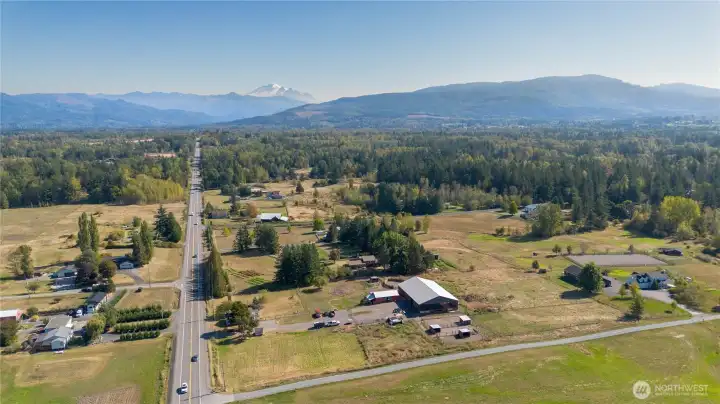 Above the home is a drone shot to put the view of Mt. Baker and foothills in perspective.