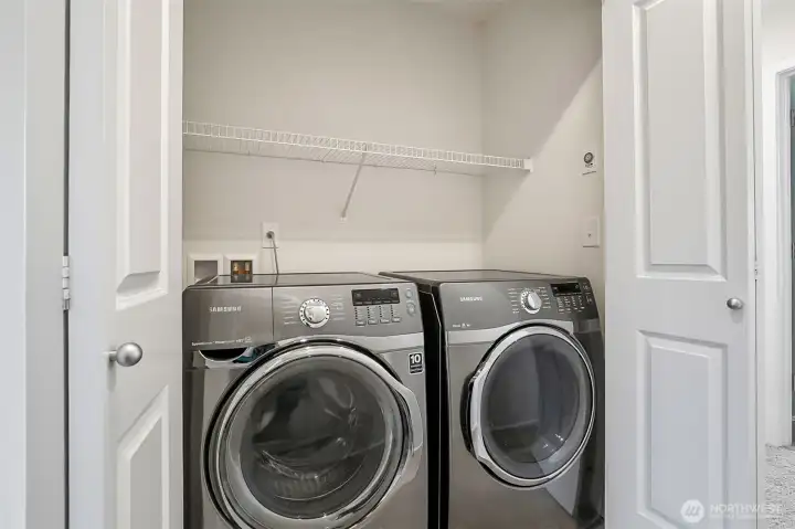 Laundry on top floor with next to primary suite.