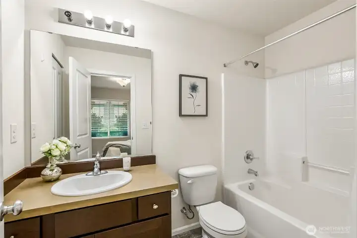 Private full bath off lower level bedroom.