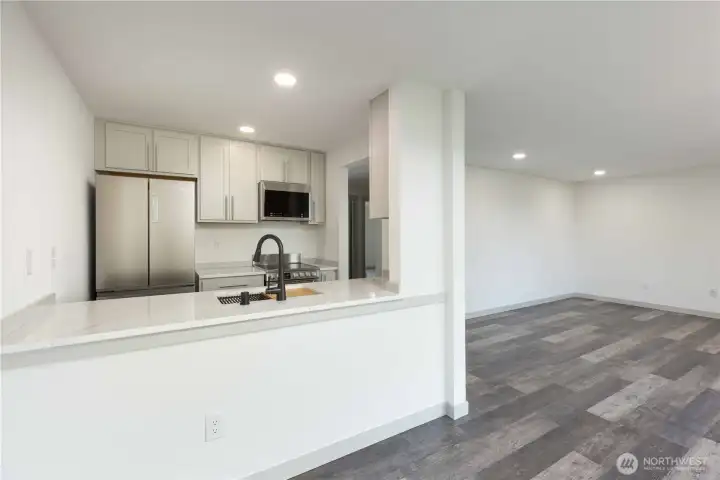 View from Dining into kitchen and Living Room
