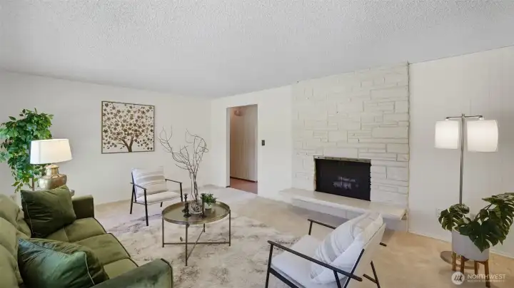 This generous living room offers a flexible layout for effortless entertaining.