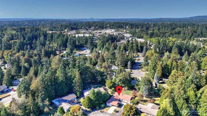 Expansive bird’s-eye view of the property and its beautiful natural surroundings.