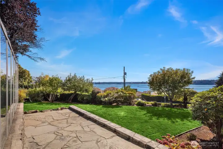 Nestled into Browns Point, this home offers stunning privacy & unmatched views