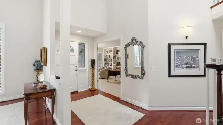 The finished work in the home is amazing.  Tall white enamel baseboards, multiple panel doors, stunning white spindle staircase and hardwood floors throughout most of th home.