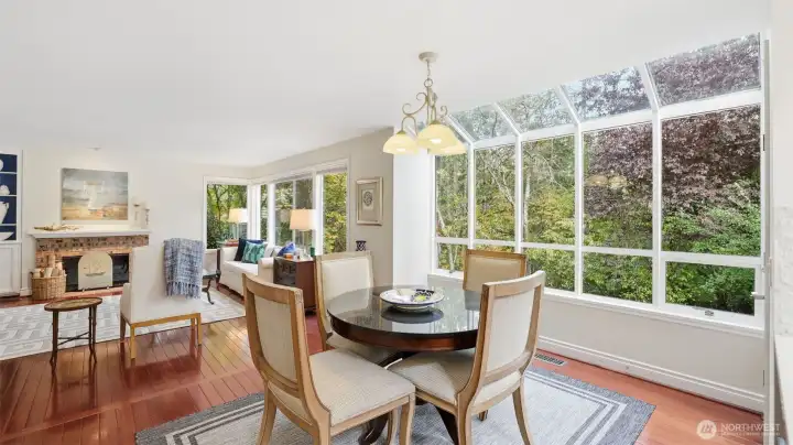 The long gorgeous bank of windows stretch the entire length of the home.  The large open family room calls for guests to come in and relax and enjoy.