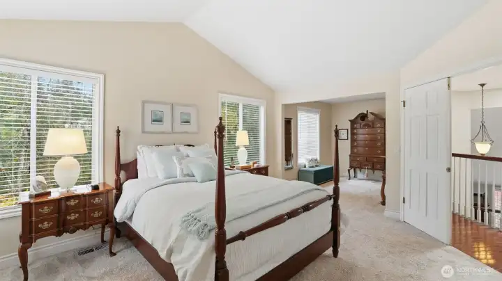 A wonderful benefit in the suite is a semi separate sitting room that is perfect for a den or craft room.