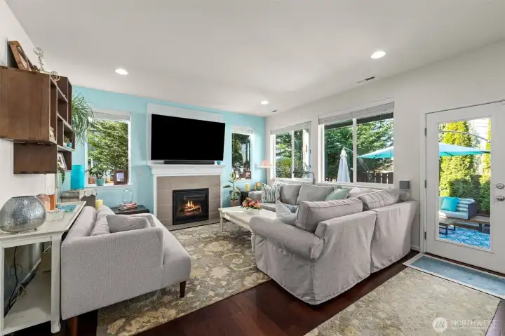 Gas fireplace with blower keeps the whole main floor warm & cozy