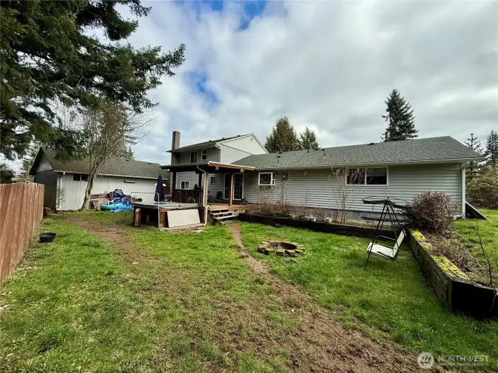 105 Timberline Dr, Castle Rock WA approx. half an acre, fenced, garden space, fruit trees, covered deck, fire pit