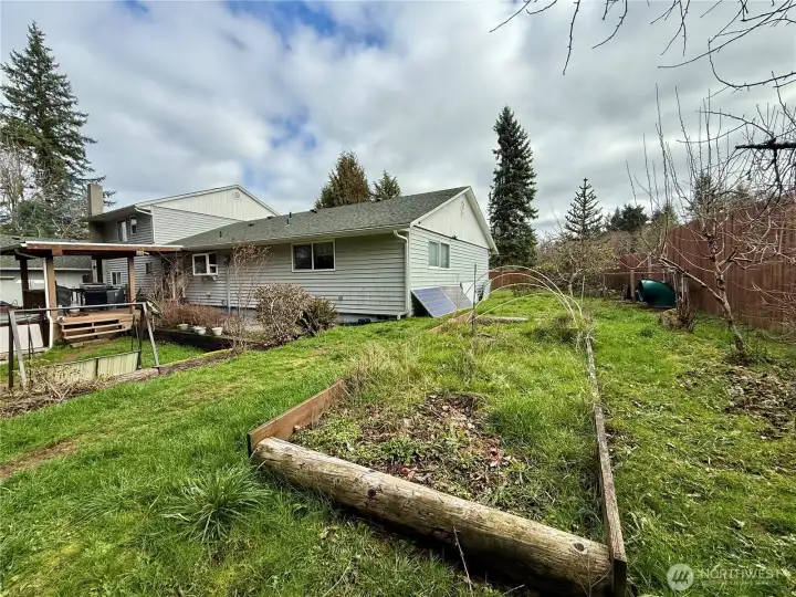 105 Timberline Dr, Castle Rock WA approx. half an acre, fenced, garden space, fruit trees, covered deck, fire pit