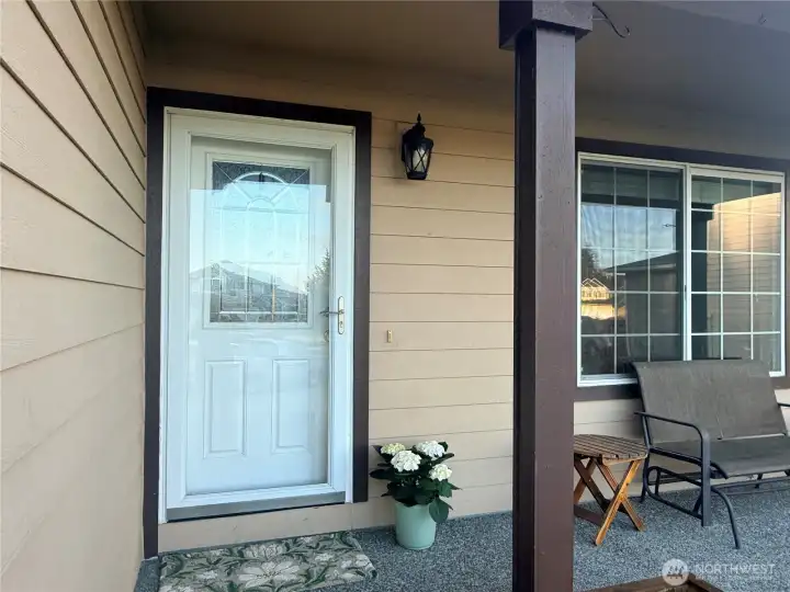 Welcoming front porch is the perfect place to enjoy a peaceful morning.