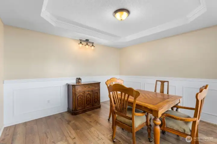 Dining room and/or game room as you enter into the home.  Plumbed wet bar stays.  This room was previously used for an in-home hair salon.