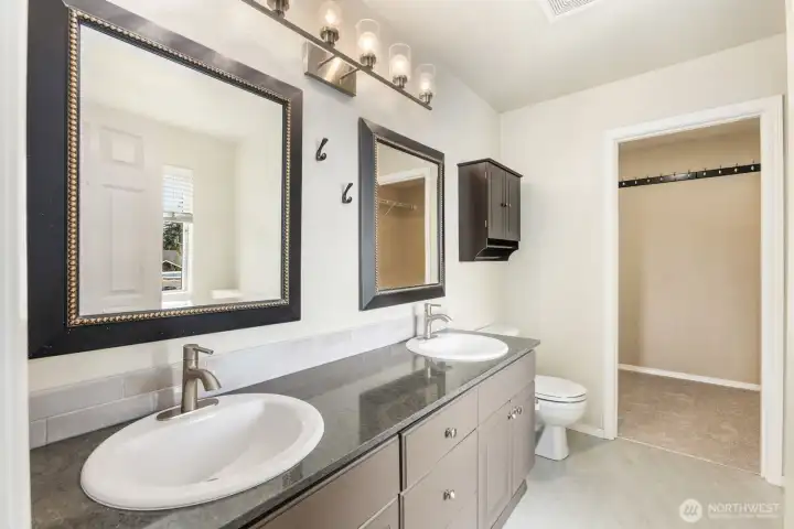 5 piece primary bath.  Plenty of space for two to get ready in the morning.