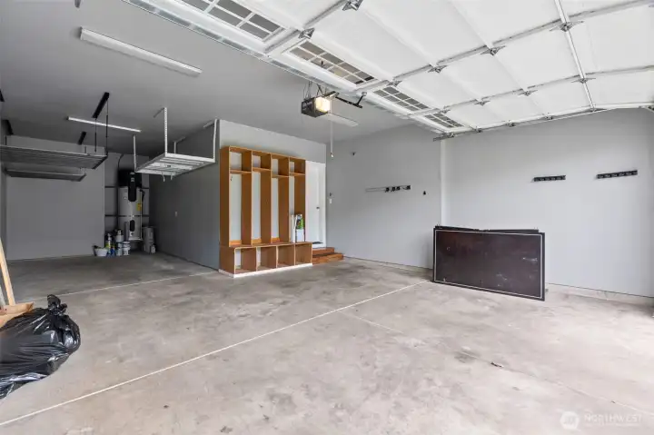 Extra deep garage with overhead storage.