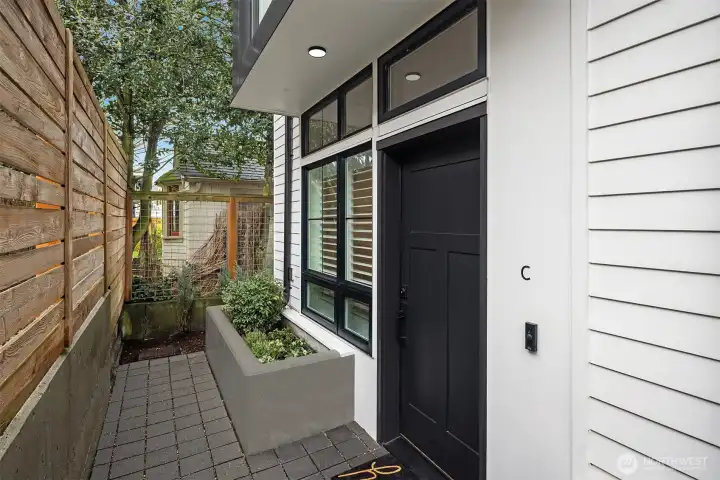 Covered Front Entry. Modern Planter.