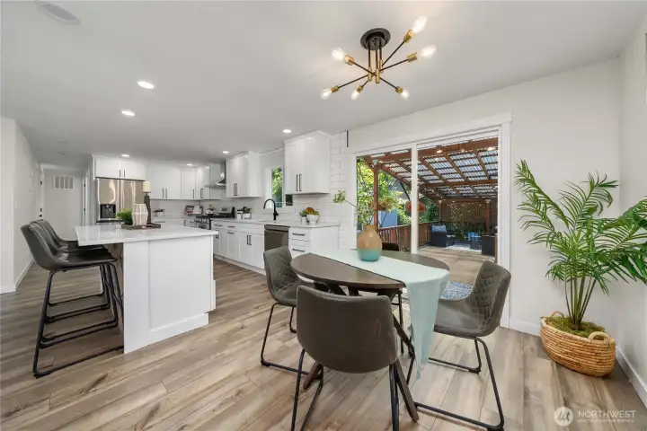 Slider off the kitchen with direct access to large all seasons patio.