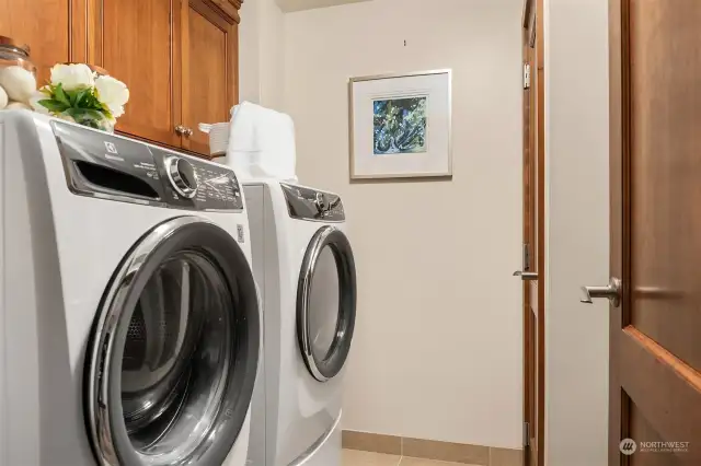 The laundry is thoughtfully located on the bedroom level.