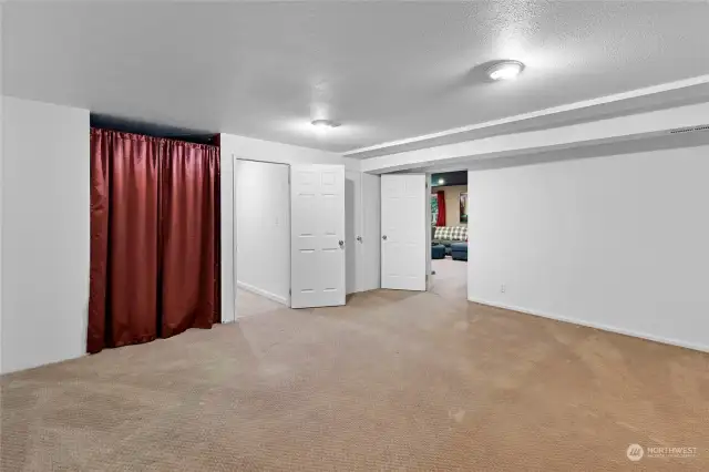 Also on the lower level, a large bonus room with a spacious closet.