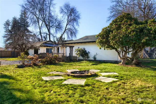 Large corner lot with firepit.