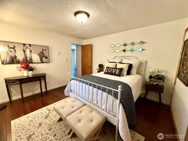 Primary bedroom right off the bath.
