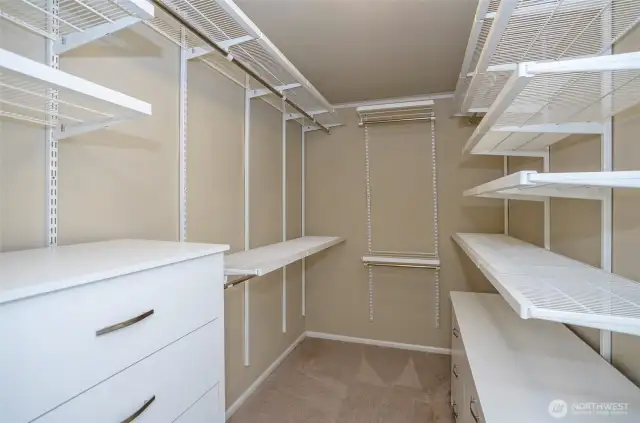 Well-appointed walk-in closet within the primary retreat.