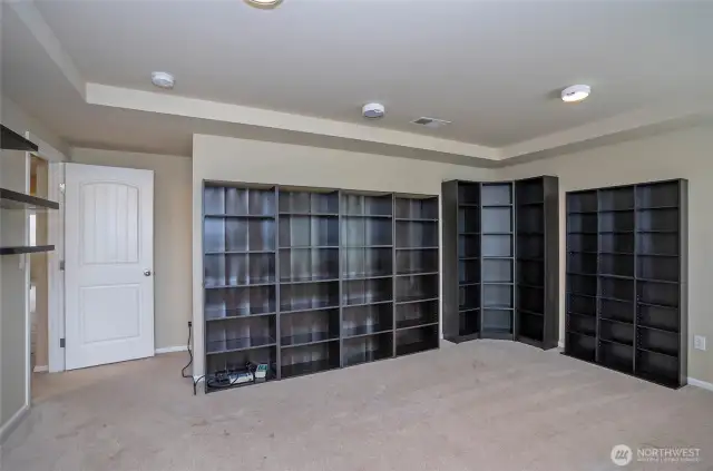 Flexible upper-level room perfect for a home office, hobby space, or optional 5th bedroom.