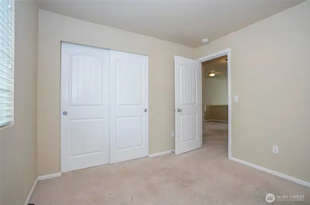 Third guest suite offers plenty of space to comfortably accommodate your visitors.