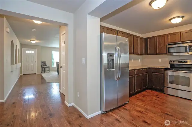 Kitchen view looking toward the entryway, offering an open and welcoming layout.