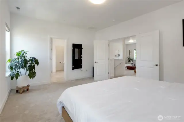 Primary bedroom and primary bathroom.