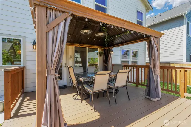 New Trex deck and gazebo with heaters and privacy curtains. Great for BBQs and outdoor entertaining.