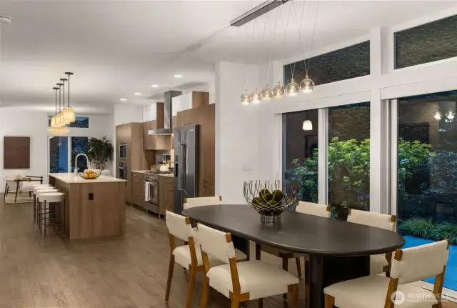 Seamless transition from formal dining space to the kitchen.
