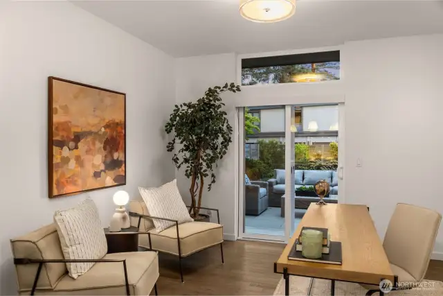 Den / office conveniently flows off the kichen to the front patio and fenced yard.