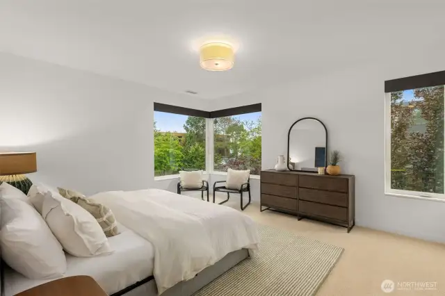 Primary suite with new carpet, fresh paint, spa-inspired bathroom, and walk-in closet.