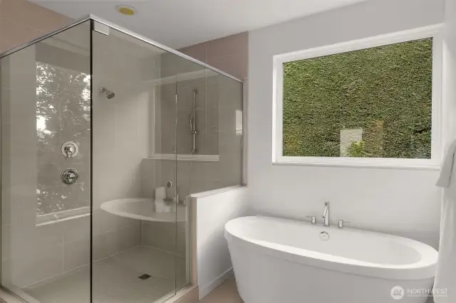 Spa-inspired bathroom with soaking tub, spacious shower, and separate sink stations.